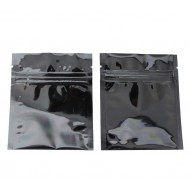 two glossy black mylar mini zipper pouches