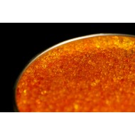 Tin full of bright orange desiccant beads