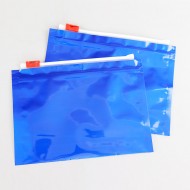 two glossy blue pouches with red slider opening