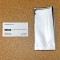 Silver Fin Seal pouch next to business card