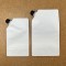 5.0" x 8.625" x 3.125" OD Matte White SpoutPak™ Stand Up Pouch with 16mm / 0.63" Fitment and Black Caps, 16.91 fl. oz. (500/case) - FTSSP05CSISLW