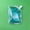 small clear spout pouch filled with blue liquid small clear spout pouch filled with blue liquid