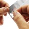 grip the die cut pocket handle and pull die cut pull tab being grasped by hands