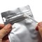pocket zipper pull tab cleanly opens the pouch hands tearing off strip halfway