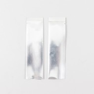 two reflective foil pouches with fold over side and bottom loading opening