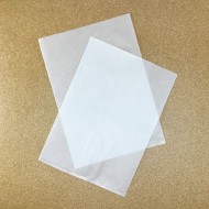 two translucent vacuum bags on top of each other