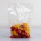 single clear vacuum bag filled with fruits