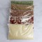 four vacum seal bags filled with rice, beans, legumes and lentils
