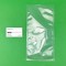 6 x 12 clear boilable pouch next to business card