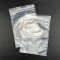 8” x 12” OD Transparent Vacuum Pouch with Tamper Evident ZipSeal, Tear Notch, and 0.25" Hang Hole (500/case) - V4Z0812ZTEHH clear zipper seal bag with beans