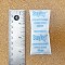 14g indicating silica gel packet next to ruler