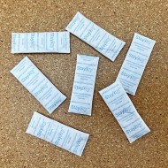piles of 2g non indicating silica gel packets