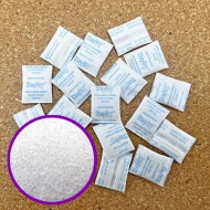 39SG01 - .25g non indicating silica gel packets piles of .25g non-indicating silica gel packets