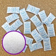 39SG03 - .5g non indicating silica gel packets piles of .5g non indicating silica gel packets