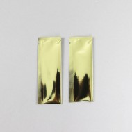 two gold foil fold over side minipouches