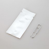 1” x 2.5” Mylar Foil Pouch with paperclip for scale