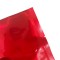lowered tear notch makes opening easier corner of red pouch with tear notch 2" from top