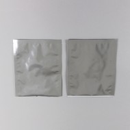 two silver foil minipouches empty with open bottom