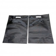 two black stand pouches flat and empty