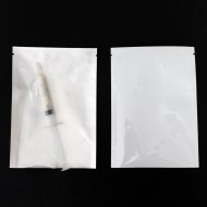 3 side seal pouches with white interior and clear front with medical syringe inside