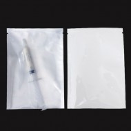 VST0425MFW06BTN 4.25" x 6" clear white medical packaging pouch white vista flat pouch with medical syringe showing clear front