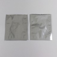 two silver foil minipouches empty with open bottom
