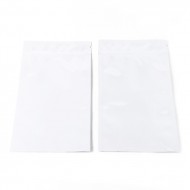 Two bright white tamper evident zipper pouches