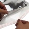 two hands opening vista filver mailer envelope