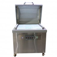 silver chamber vacuum sealer with lid open