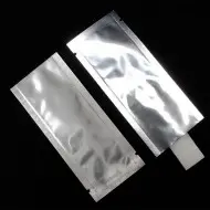 two silver minipouches with assay inside