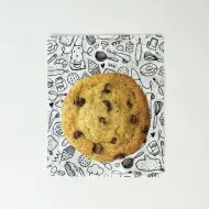 White pouch with printed cookie on front