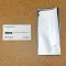 Silver Fin Seal pouch next to business card Silver Fin Seal pouch next to business card