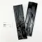 black coffee bags next to business card