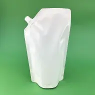 white stand up spout pouch filled with liquid
