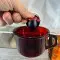 Vitop spigot pouring sangria into red glass