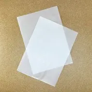 two translucent vacuum bags on top of each other