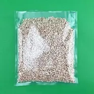 12" x 14" OD Transparent Vacuum Pouch filled with grain