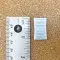 half gram desiccant packet next to ruler