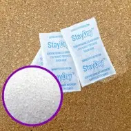 piles of silica gel non indicating desiccant packets 
