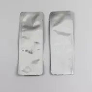 two empty mylarfoil pouches with rounded corners