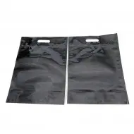 two black stand pouches flat and empty