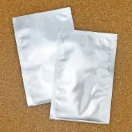 two shiny silver foil pouches with easy loading lip