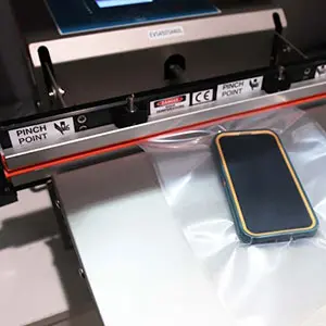 smart phone being vacuum sealed