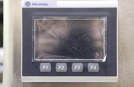 Close up of Allen-Bradley branded control touchscreen
