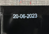 Example of White Ink -- Date inkjet printed bar code