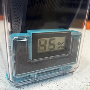 sealed storage box with humidity infdicator and desiccant holder