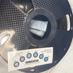 humidity indicating card sealed in vacuum bag with filament and desiccant
