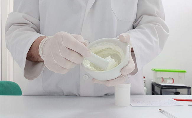 medication being prepared at a compounding pharmacy